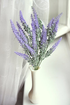 Fototapeta Artificial Lavender purple flower on the vase