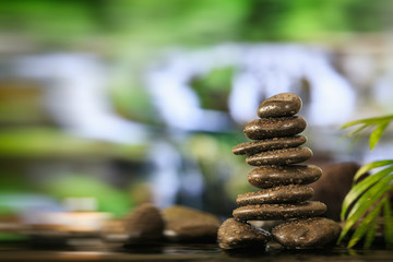 Zen stones stack on abstract background