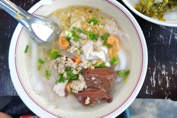 kuay jap ,paste of rice flour, boiled Chinese pasta square. Asian noodle with pork, pork blood, and shrimp.