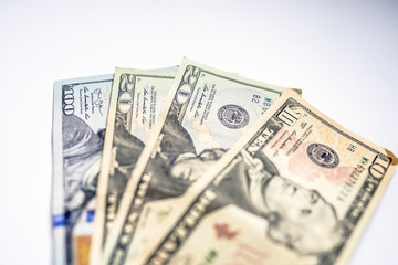 many dollars on a white background isolated