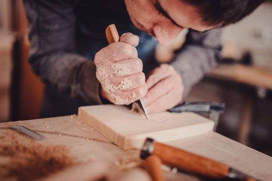 Wood Processing. Joinery Work. Wood Carving. The Carpenter Uses A Cutting Knife For Framing