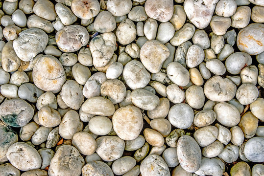 decorative white stones, round stones on white background, Stones or Gravel for building