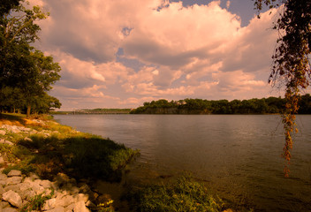 Tennessee river at sunset from bank of park in Florence Alabama.