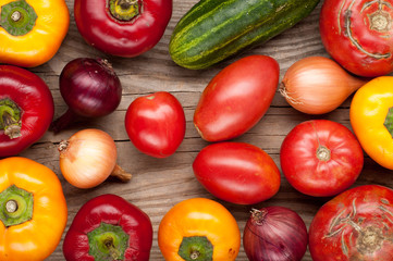 vegetables crop background onions garlic tomatoes, pepper, cucumber. top view