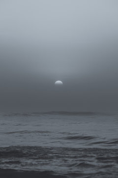 Fototapeta Black and white sun during sunset