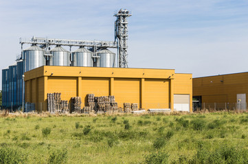 External view of a typical factory Building with agricultural silos