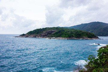 view of andaman sea with mountain and sky background