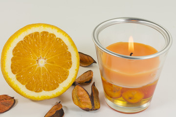 Aromatic candle for home with orange odor 