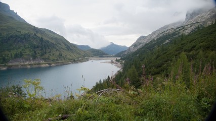 Fototapeta na wymiar lago fedaia lake in dolomites at marmolada