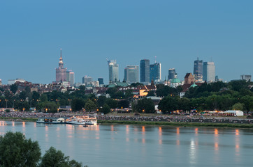 Evening panorama of Warsaw Vistula river waterfront and downtown skyline © tomeyk