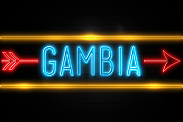 Gambia  - fluorescent Neon Sign on brickwall Front view