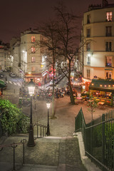 Naklejka premium Square on the rue Maurice Utrillo at night