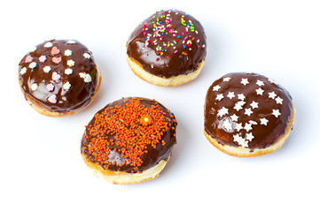 Decorated chocolate donuts isolated on white background