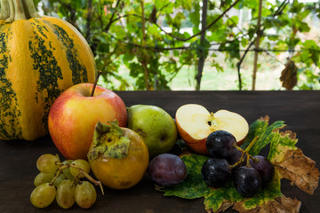 Obraz na płótnie Canvas fresh and beautiful fruits and vegetables with autumn pumpkin pumpkins still life