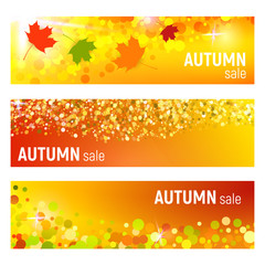 Naklejka na ściany i meble Set of three vector banners with colorful autumn leaves and circles on a orange background. Autumn banners with leaves and circles. Vector illustration.