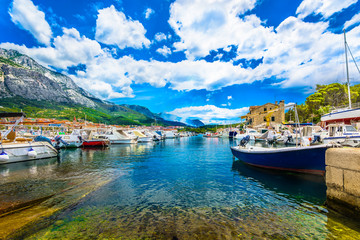 Makarska town scenic view. / Scenic colorful view at Makarska Riviera in Croatia, popular tourist destination in Southern Europe. - obrazy, fototapety, plakaty