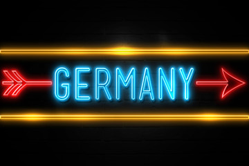 Germany   - fluorescent Neon Sign on brickwall Front view