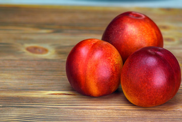 peaches on a wooden background