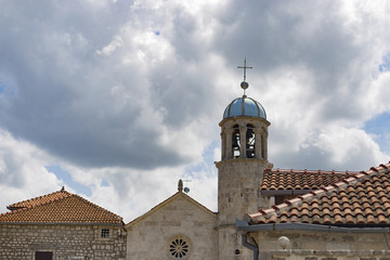 the old stone of the ancient Church, bathed in the sky