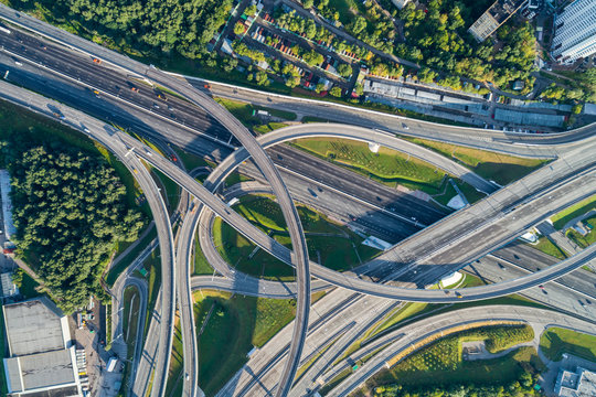 Complex junction and cars traffic. Aerial vertical shot.