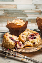 Muffins with red fruits jam fill.