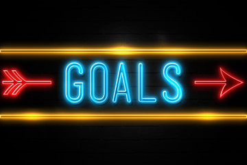 Goals  - fluorescent Neon Sign on brickwall Front view