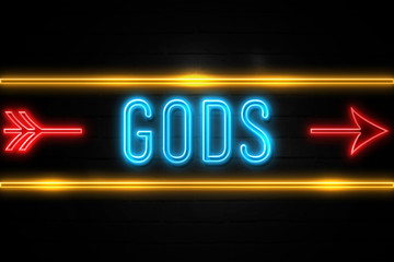 Gods  - fluorescent Neon Sign on brickwall Front view