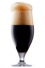 Mug of frosty dark beer with foam isolated on a white background
