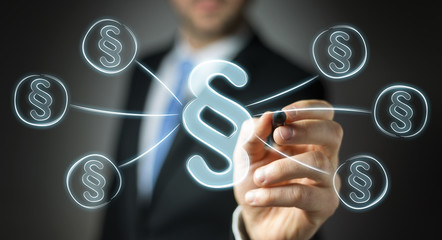 Businessman drawing law protection right symbol