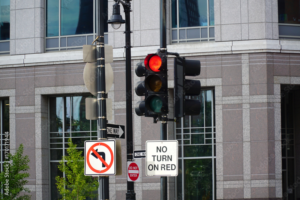 Wall mural street scene of red traffic light in the city