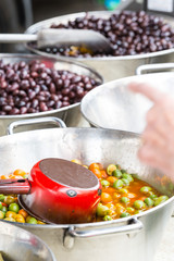 stall with Mediterranean olives for sale in the local market.