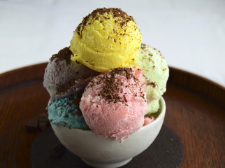 Multi-colored ice cream. A tasty dessert for good mood.