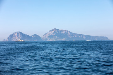 The Island of Capri is a very picturesque, luxuriant and extraordinary location in Italy famous for its high rocks.