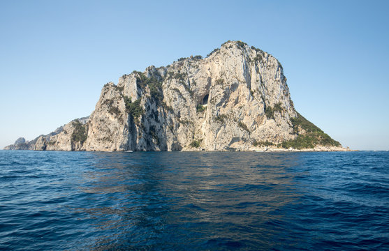 The Island of Capri is a very picturesque, luxuriant and extraordinary location in Italy famous for its high rocks.