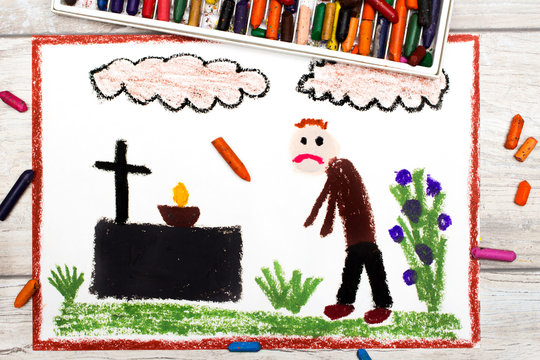 Photo of colorful drawing: Sad man and grave.