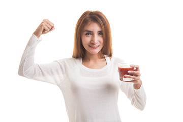 Strong healthy Asian woman with tomato juice.