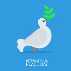 White Peace dove with olive branch for International Peace Day poster on blue sky abckground