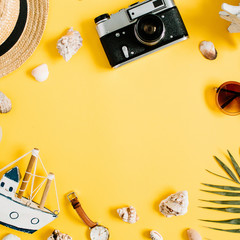 Flat lay traveler accessories on yellow background with blank space for text. Top view travel or vacation concept. Summer background.