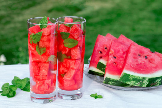 Detox water with watermelon and mint. Slices of watermelon with mint leaves. 