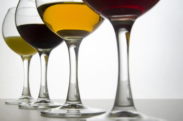 a glass with wine, beer, champagne, juice, water