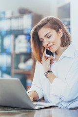 Young woman working on laptop