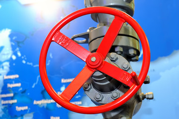 Red industrial valve on pipelines system