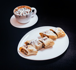 Homemade apple pies decorated with chocolate