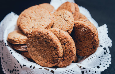French cookies with jam on the white plate.