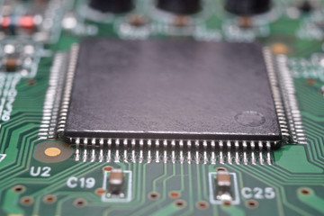 close up of electronic components on pcb board