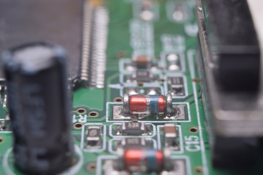 close up of electronic components on pcb board