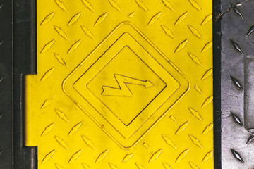 Danger sign high voltage on a floor