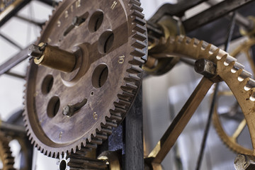 Old mechanism of a big tower clock. cogwheels in the clock