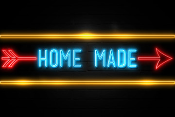 Home Made  - fluorescent Neon Sign on brickwall Front view