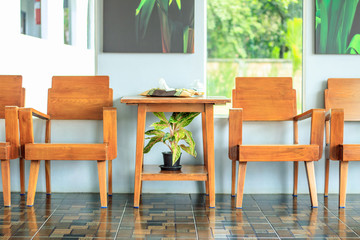 wooden chair and table in the reception room.